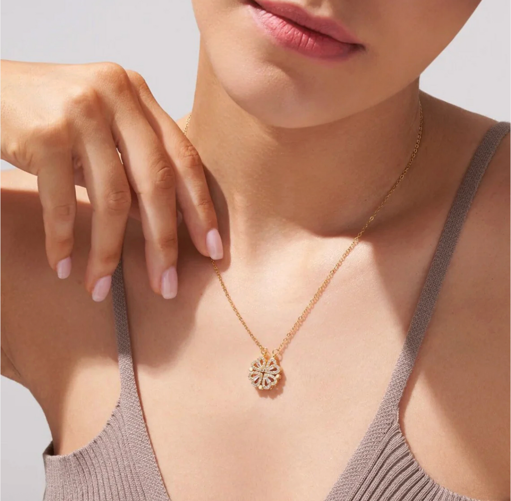 The Clover four-heart magnetic necklace worn in gold