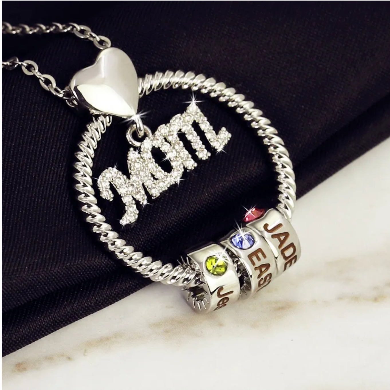 The Halo MOM circle birthstone necklace in silver with engraved name beads