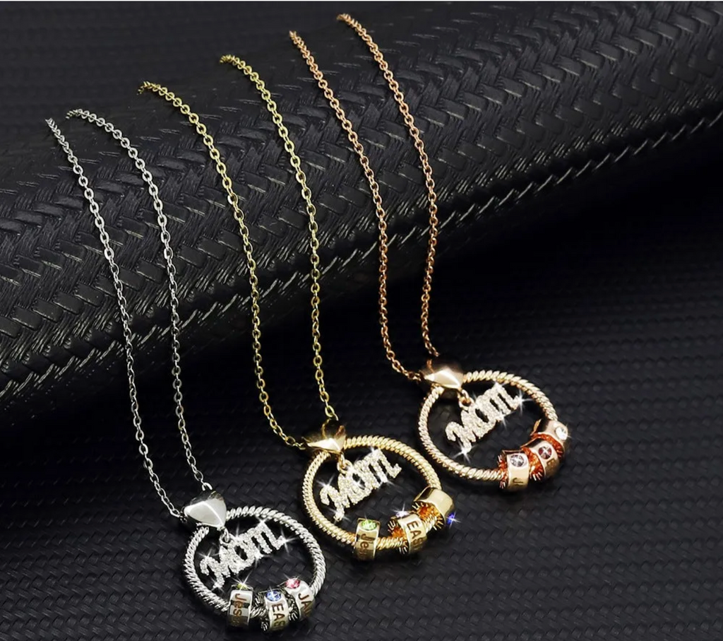 The Halo MOM circle necklace shown in silver, gold and rose gold