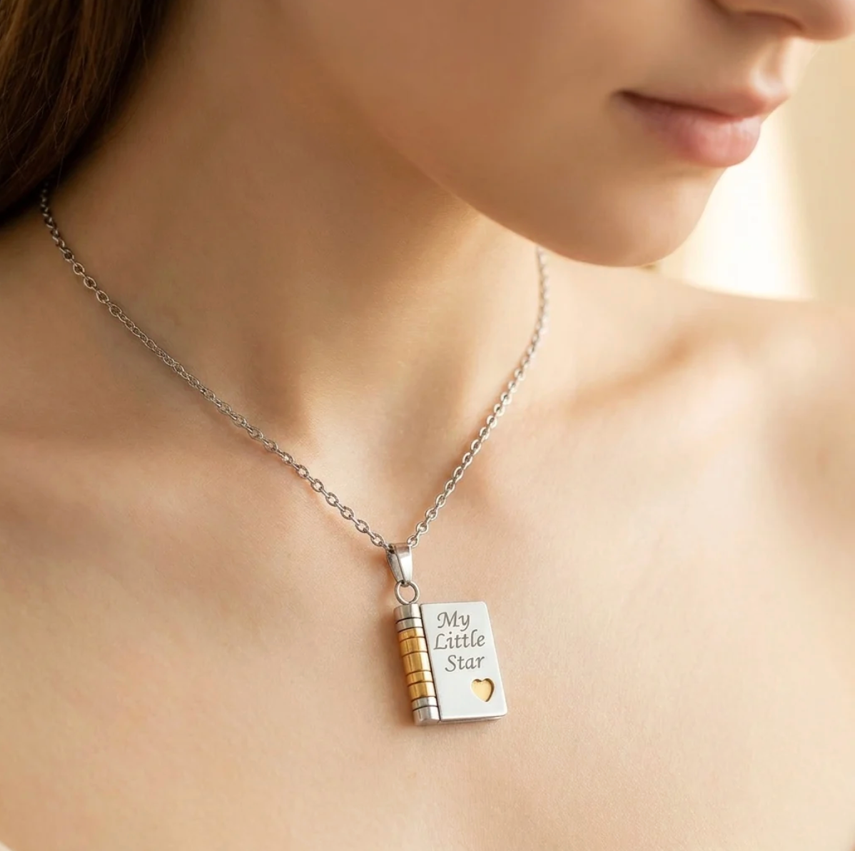 The Little Star book locket necklace worn close up